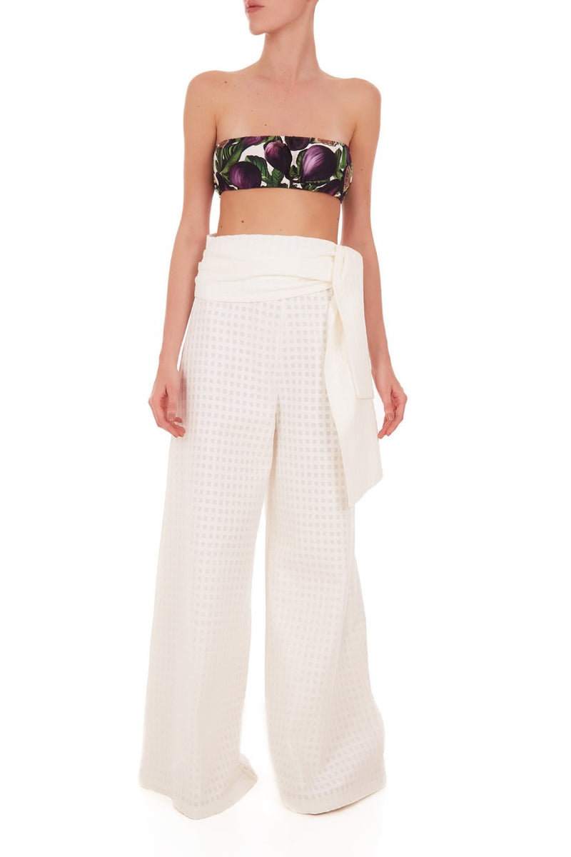 These cotton pants have an extra-long wide leg and can be worn on vacation with a matching shirt and slides for a contemporary outfit