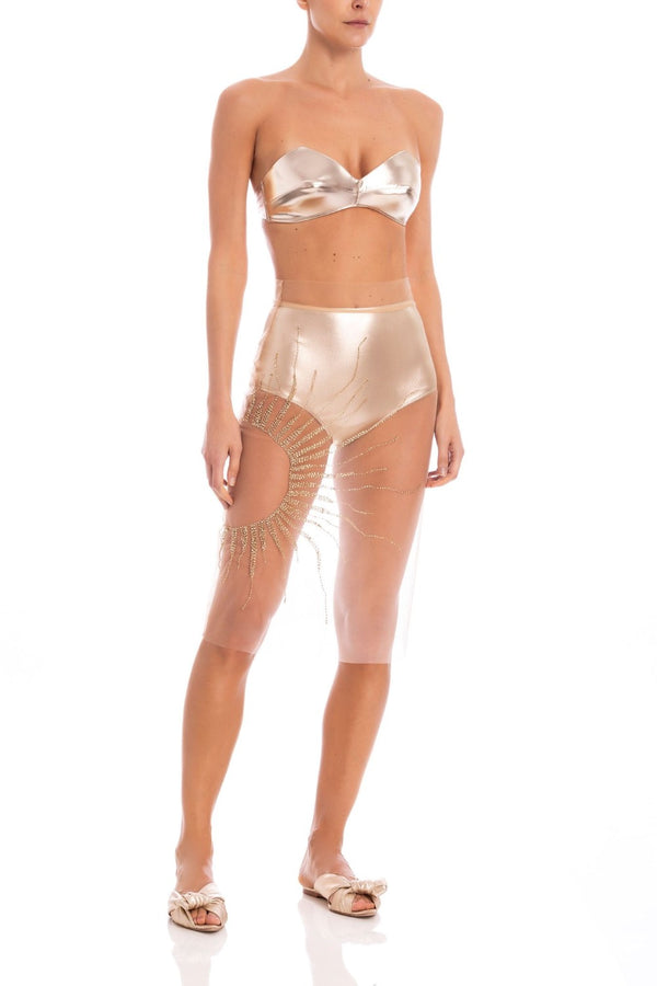 This Soleil skirt and hot pants set, is made for a sim fit with high-rise waist and features a transparent tulle fabric