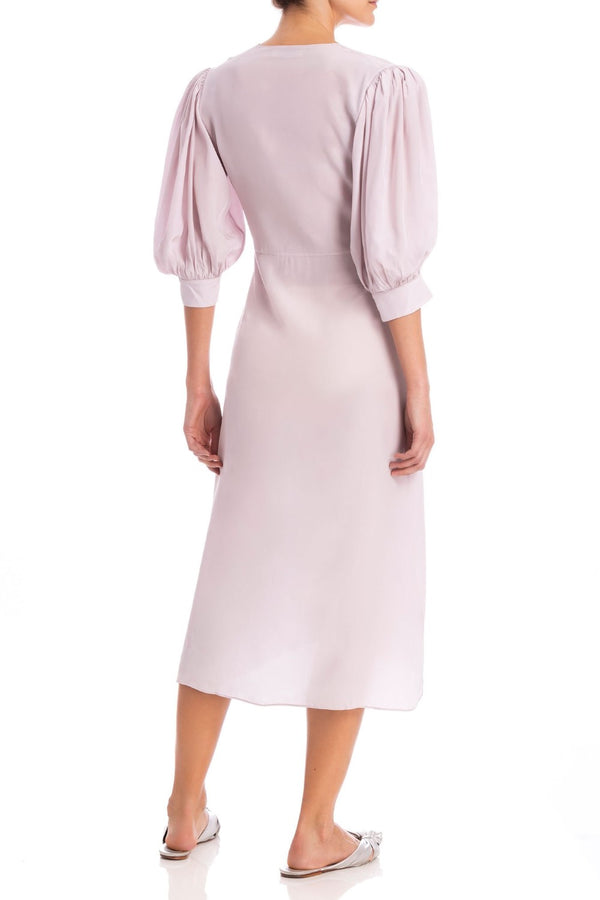 This timeless and elegant robe was inspired by Italian Riviera, is crafted from silk and falls to a midi length