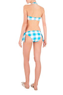 This halterneck retro style bikini is inspired by pieces discovered in vintage stores and markets the designer visits. It´s made in Brazil with stretch fabric- the top and the briefs are self-tie for your perfect fit. Wear yours with matching robe for a modern outfit
