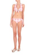 This halterneck retro style bikini is inspired by pieces discovered in vintage stores and markets the designer visits. It´s made in Brazil with stretch fabric- the top and the briefs are self-tie for your perfect fit. Wear yours with matching robe for a modern outfit