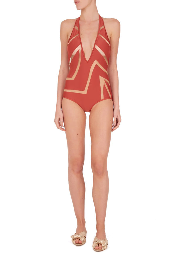 Combining graphism and zebra exotic inspiration, these long triangle tulle hot pants are a must-have piece on your vacation wardrobe