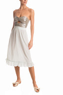 This charming and feminine strapless dress is made of silk with metallic top for a vintage allure