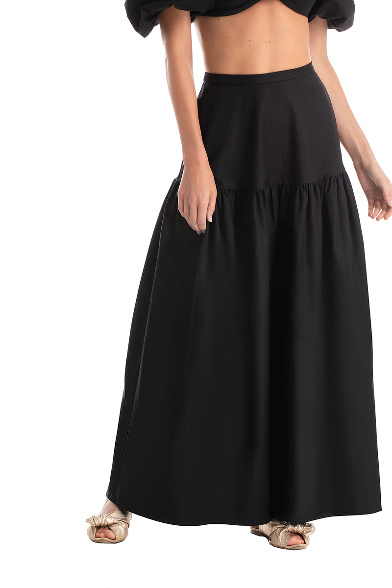 This long skirt is an easy chic piece to be worn after the beach. We love it with a matching swimsuit for drinks with friends poolside on your next getaway